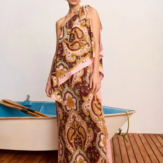 model wearing long pattern dress