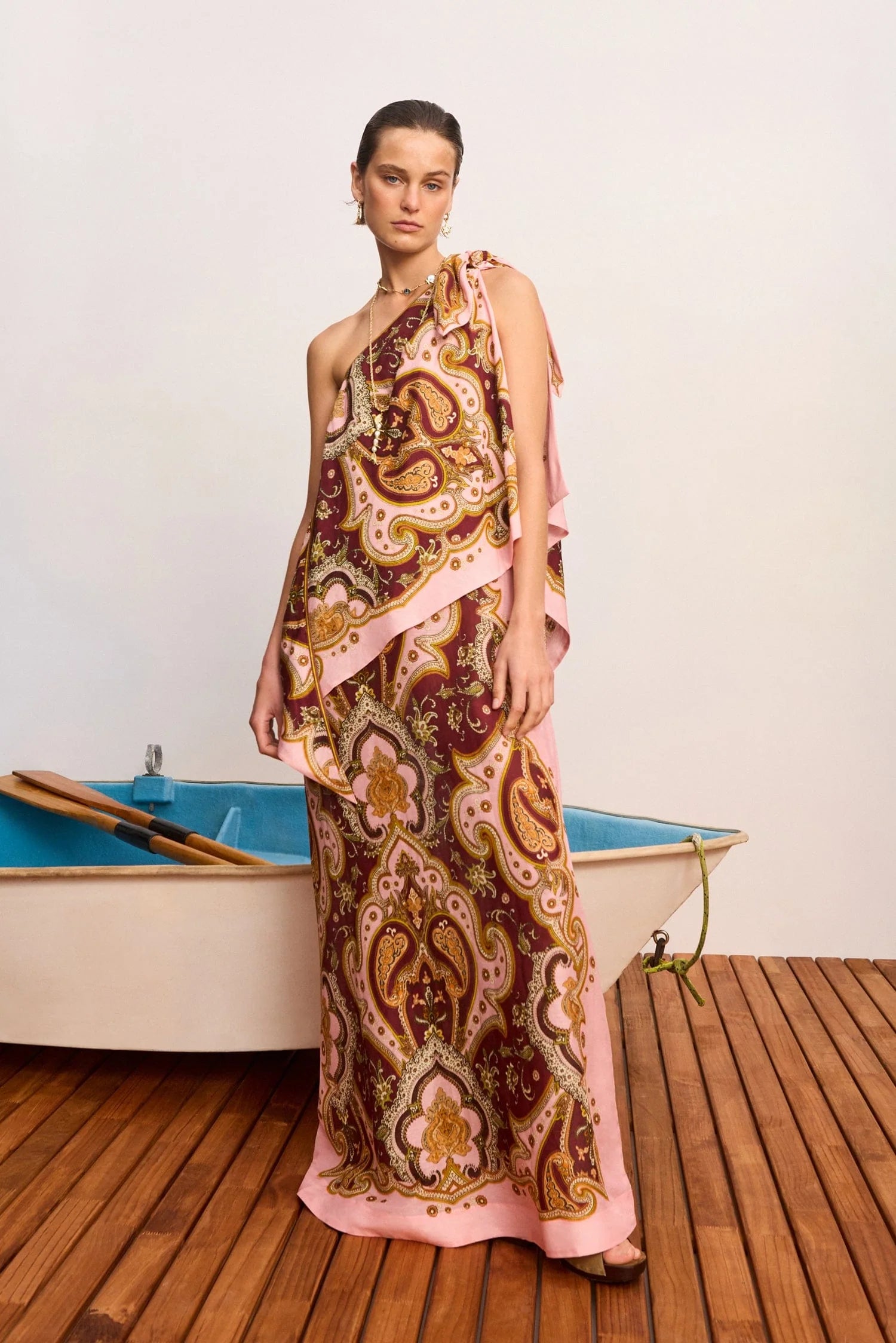 model wearing long pattern dress