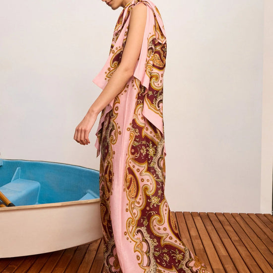 model wearing long pattern dress