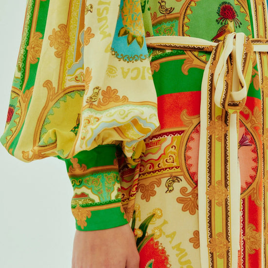 vibrant print silk shirtdress with balloon sleeves and tiered skirt  close up