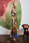 Woman wearing patterned Alemais dress side view