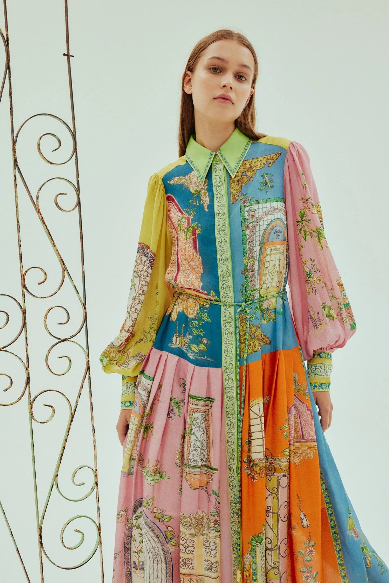 mid length colourful shirtdress with balloon sleeves and self tie belt with a point collar and concealed placket model shot