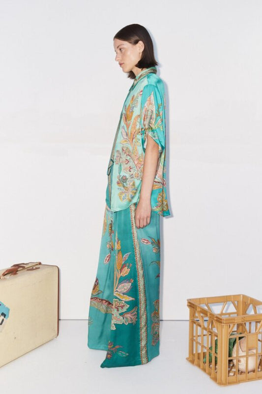 teal silk trousers with elasticated waist and floral print side view