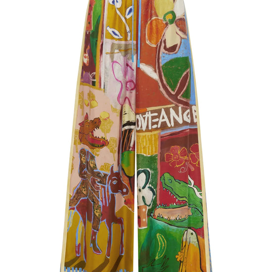 Colourful patchwork trousers with floral and abstract patterns by Alemais on a white background