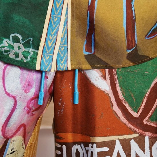 Colorful fabric with abstract patterns and text 