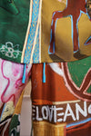 Colorful fabric with abstract patterns and text 
