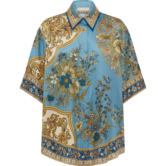 Decorative shirt with floral and baroque patterns on a white background