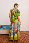 Rear view of woman wearing a colourful cotton skirt with a scarf as a top