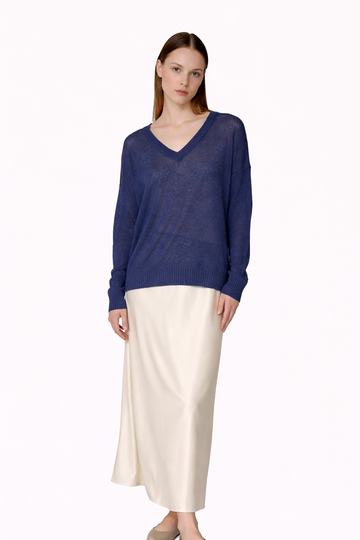 blue jumper on model on white background