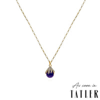 Gold plated necklace with pave diamond claw clasp and amethyst stone