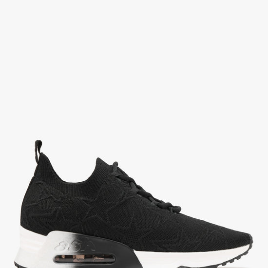 Black textile trainer with star design black laces and a white sole with air bubble