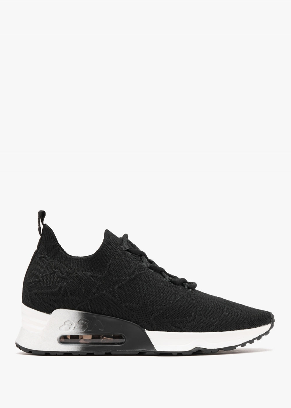 Black textile trainer with star design black laces and a white sole with air bubble