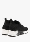 Black textile trainer with star design black laces and a white sole with air bubble