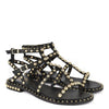 Black leather cage style sandal with gold stud details throughout