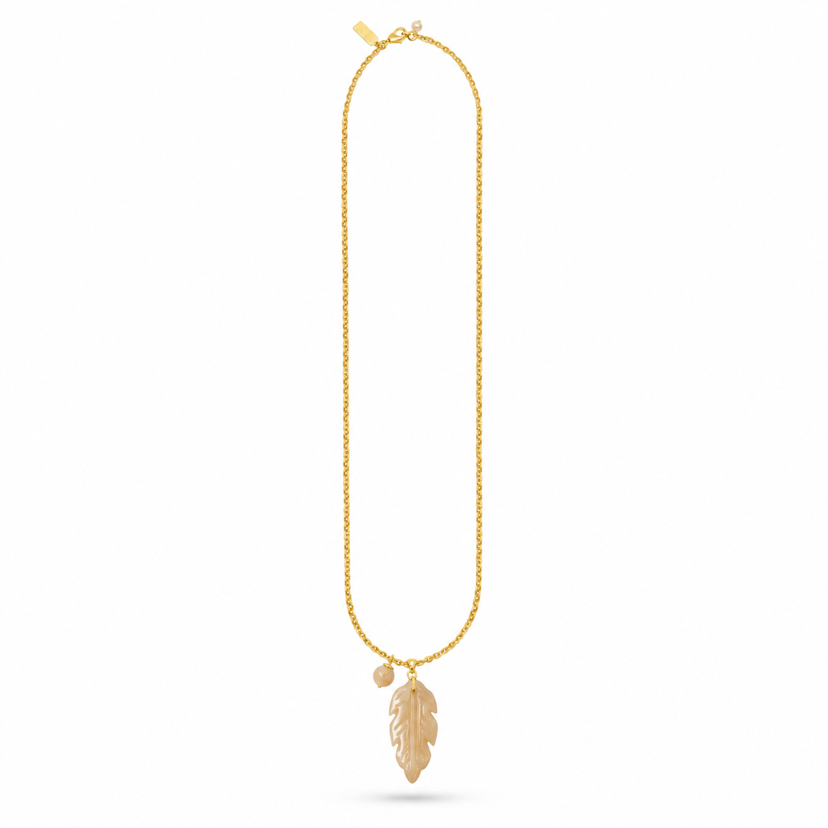 gold chain necklace with a smokey quarts stone leaf pendant on the necklace