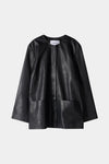 Black leather cape on a light gray background