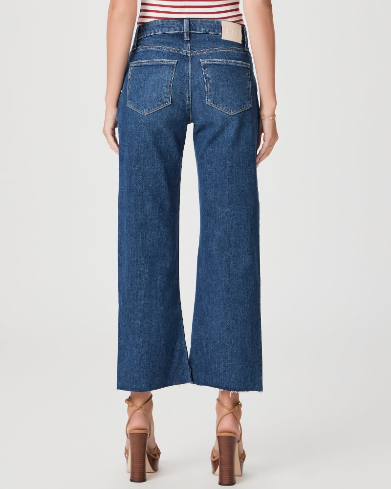 Cropped mid wash jeans with a slim wide leg rear view