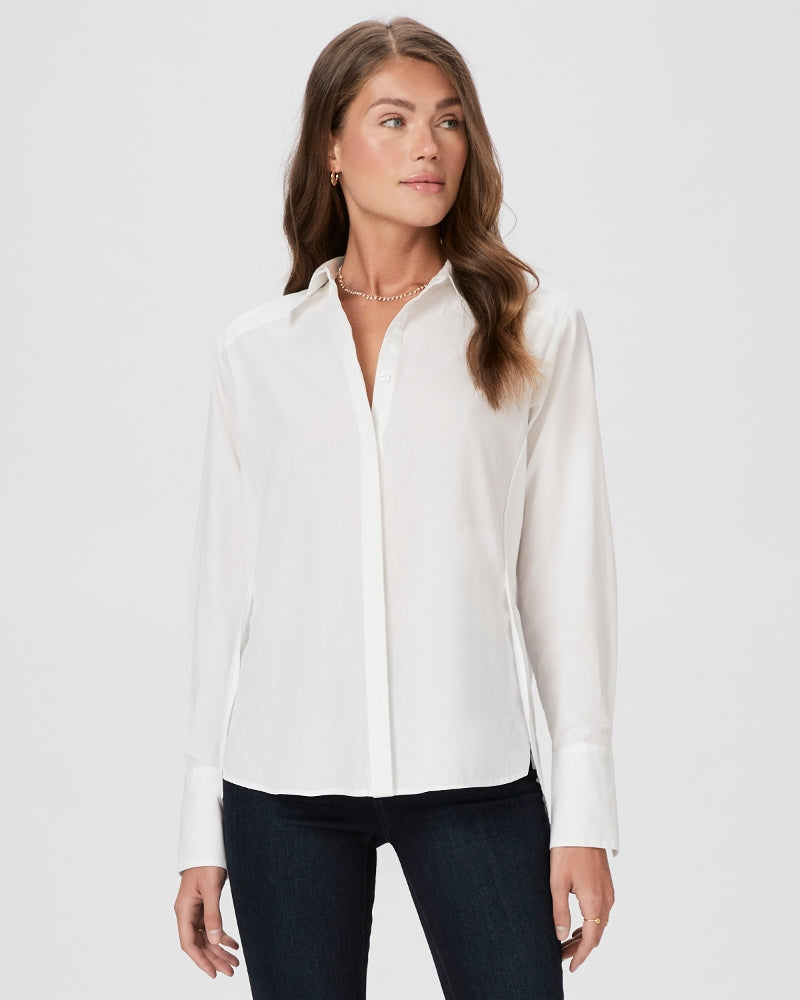 White shirt with full length covered placket and classic collar with side vents and curved dropped hem