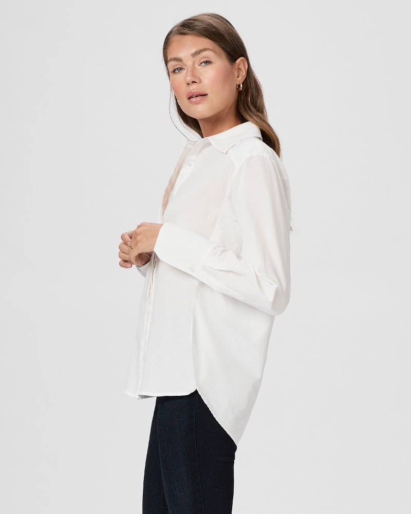 White shirt with full length covered placket and classic collar with side vents and curved dropped hem