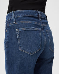 Wide leg mid to dark wash five pocket jeans