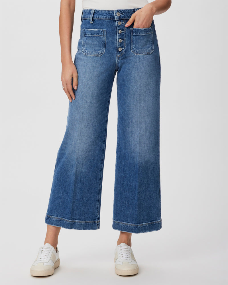 Light wash cropped wide straight leg jeans with front patch pockets and silver button zip fly