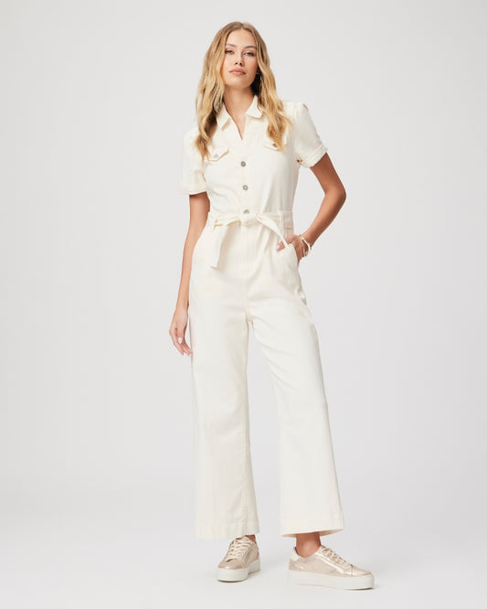 Cream short sleeved jumpsuit with straight leg, tie waist and silver button fastening