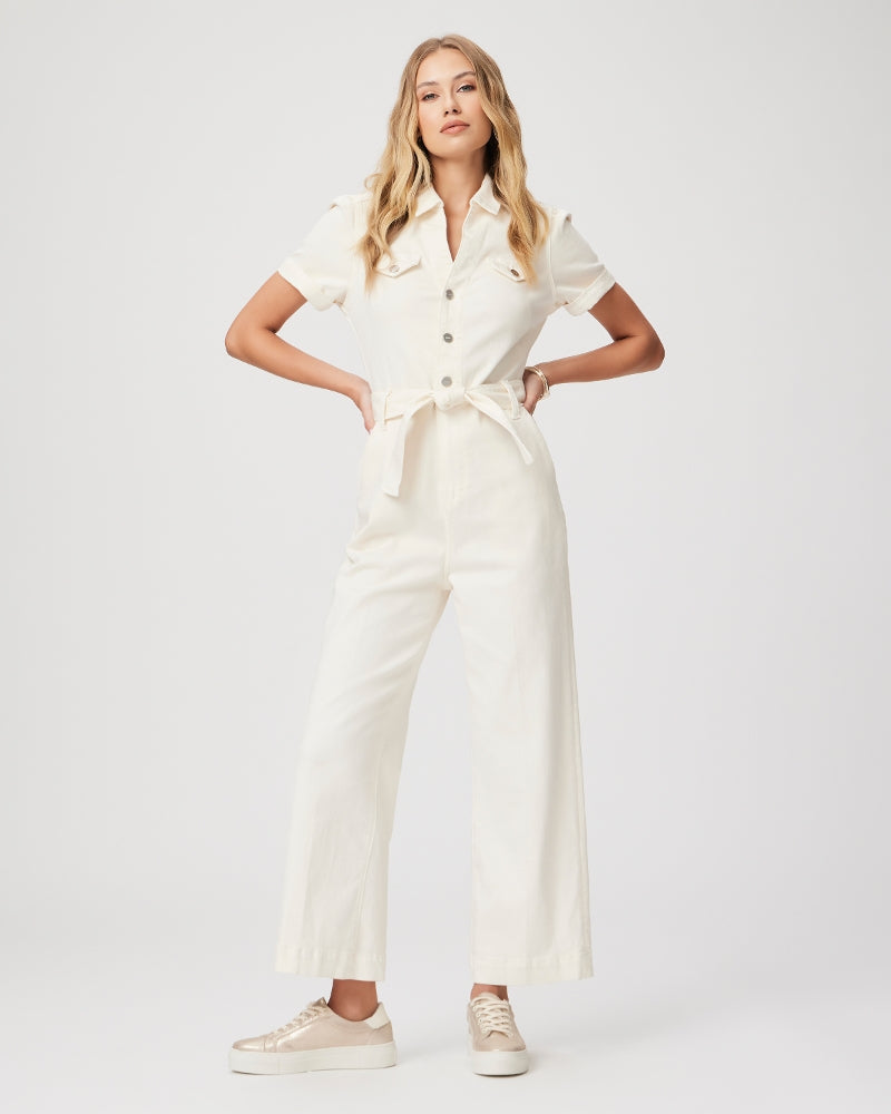Cream short sleeved jumpsuit with straight leg, tie waist and silver button fastening