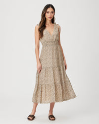 Ditsy print midi length dress with tiered skirt and smoked waist