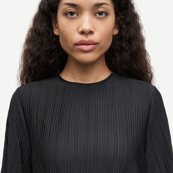 short sleeve pleated black top with round neck from samsoe samsoe model shot close up
