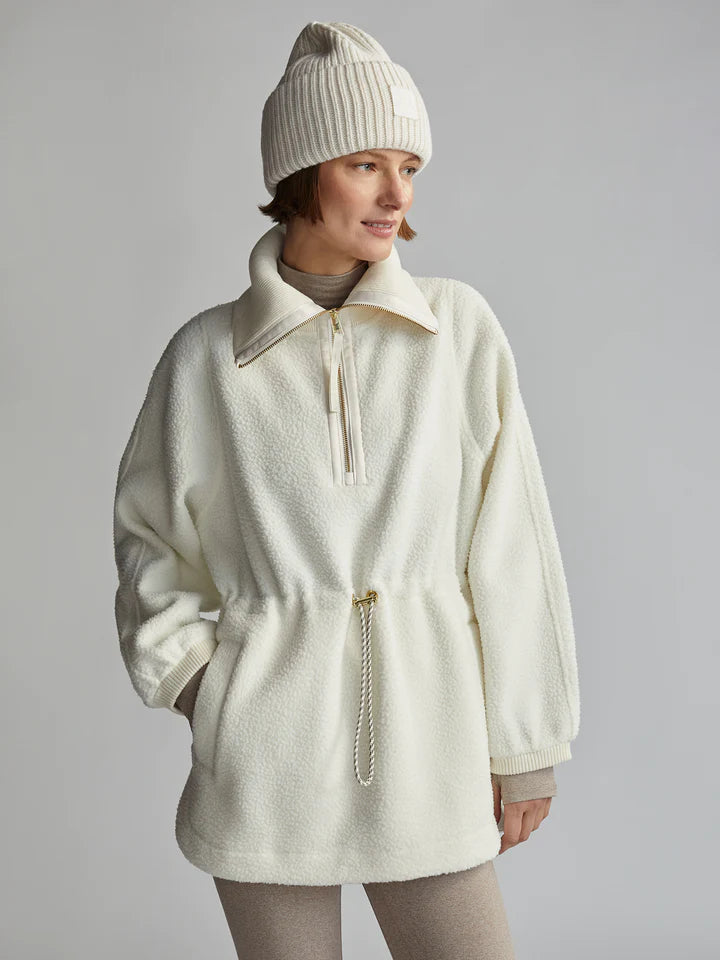 Winter white fleece jacket with half zip fastening and drawstring rope waist fastening