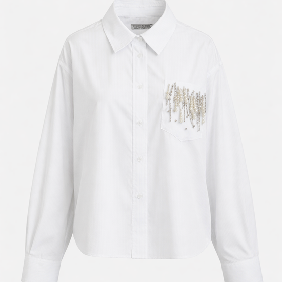 White shirt with gold embroidery on a white background