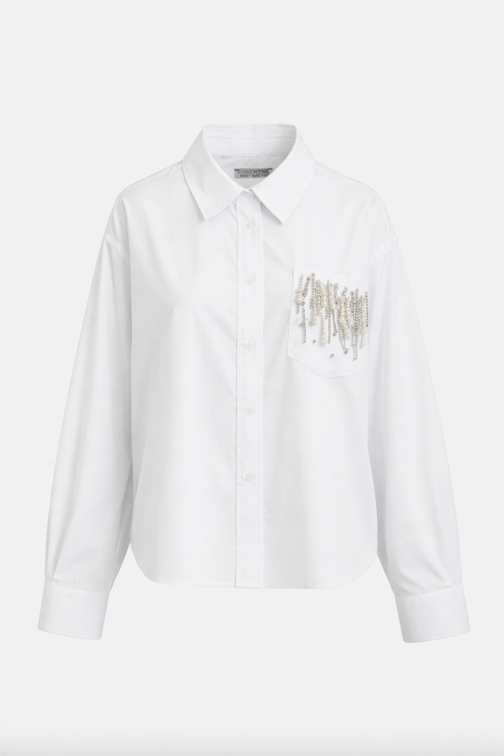 White shirt with gold embroidery on a white background