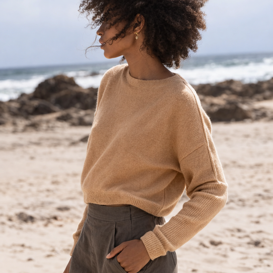 Camel colour cashmere jumper worn with khaki linen trousers from Lilly Pilly