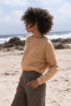 Camel colour cashmere jumper worn with khaki linen trousers from Lilly Pilly
