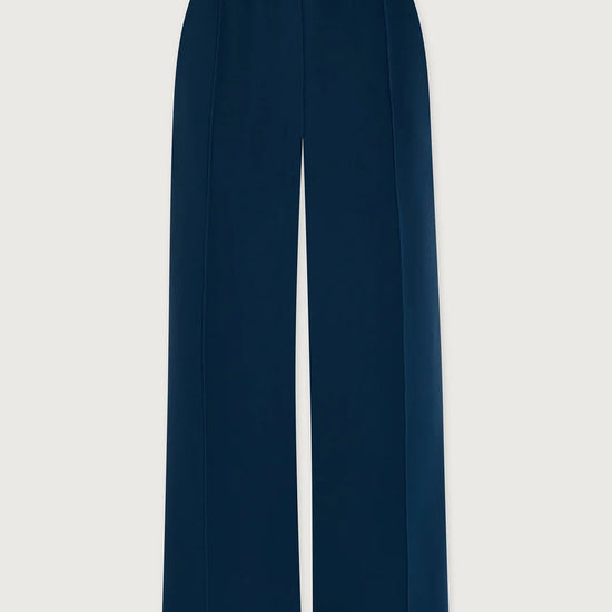 A pair of high-waisted, wide-leg trousers in a deep navy blue, shown flat against a light gray background.