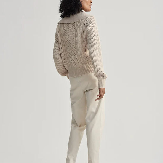 beige cable knit sweater with oversized collar and quarter zip rear view