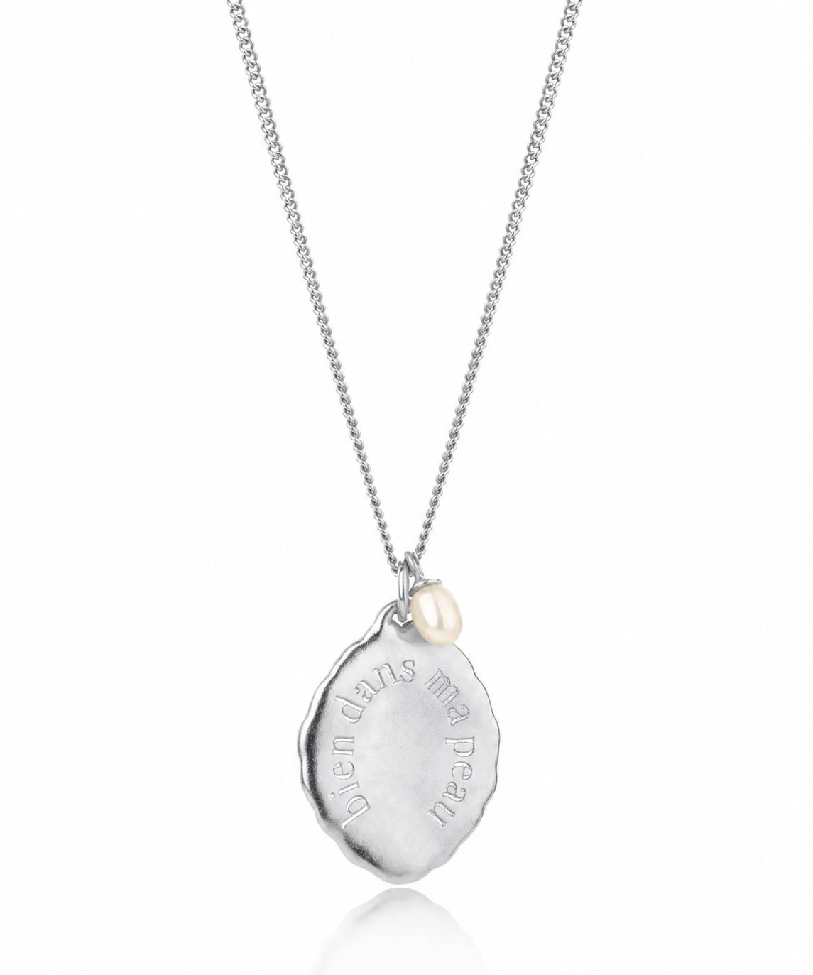 Silver necklace with a pendant on a white background