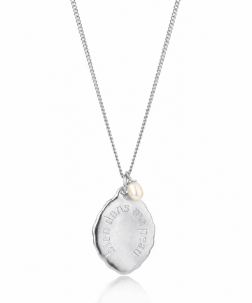 Silver necklace with a pendant on a white background
