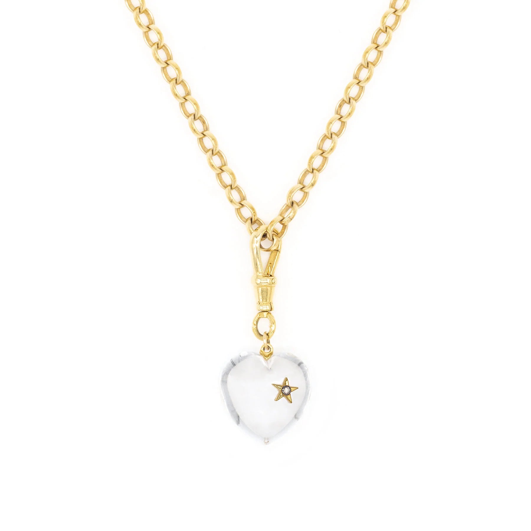 Chunky quartz heart pendant with a star and diamond detail on a gold plated sterling silver belcher chain
