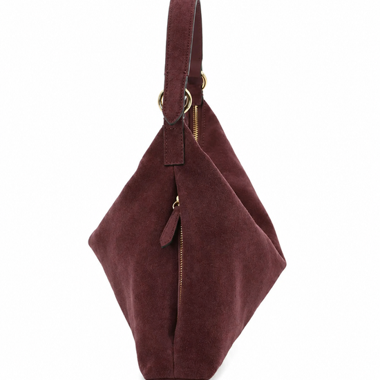 A dark brown suede hobo shoulder bag with a single leather strap and gold-tone hardware, shown against a plain white background.