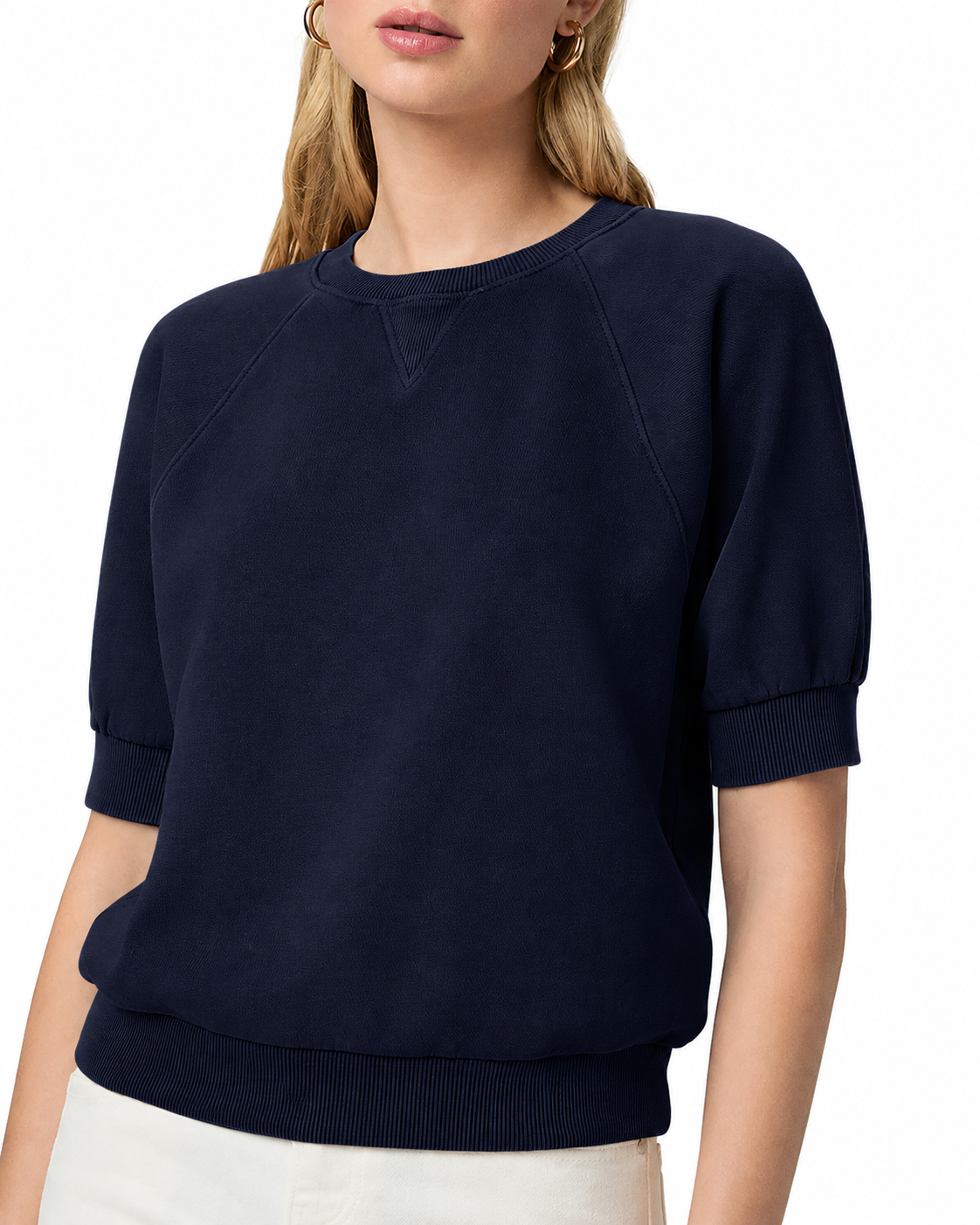 model wearing a navy blue short sleeve sweatshirt on a plain white background 