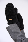 Black fleece-lined mittens worn on hands, shown against a plain white background. The sleeves are gray, and a small tan brand tag is visible on one mitten.