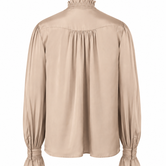 A beige long-sleeve blouse with a ruffled mock neck, gathered waist, and ruffled cuffs, shown from the back on a white background.
