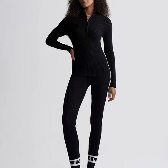 black ribbed jumper with zipped neck and white panel on side  model shot 