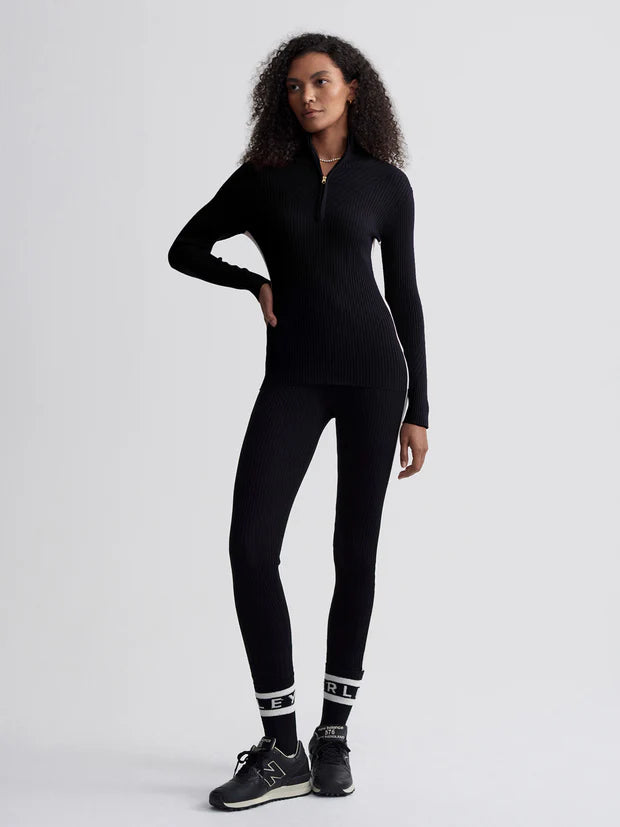 black ribbed jumper with zipped neck and white panel on side  model shot 