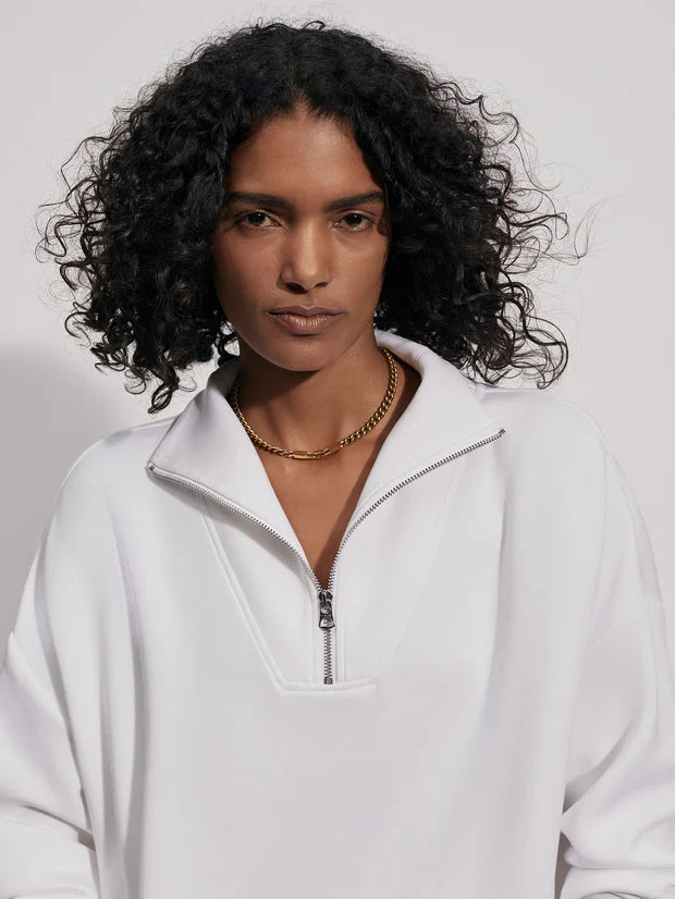 White half zip doublesoft sweatshirt with silver hardware and turtleneck