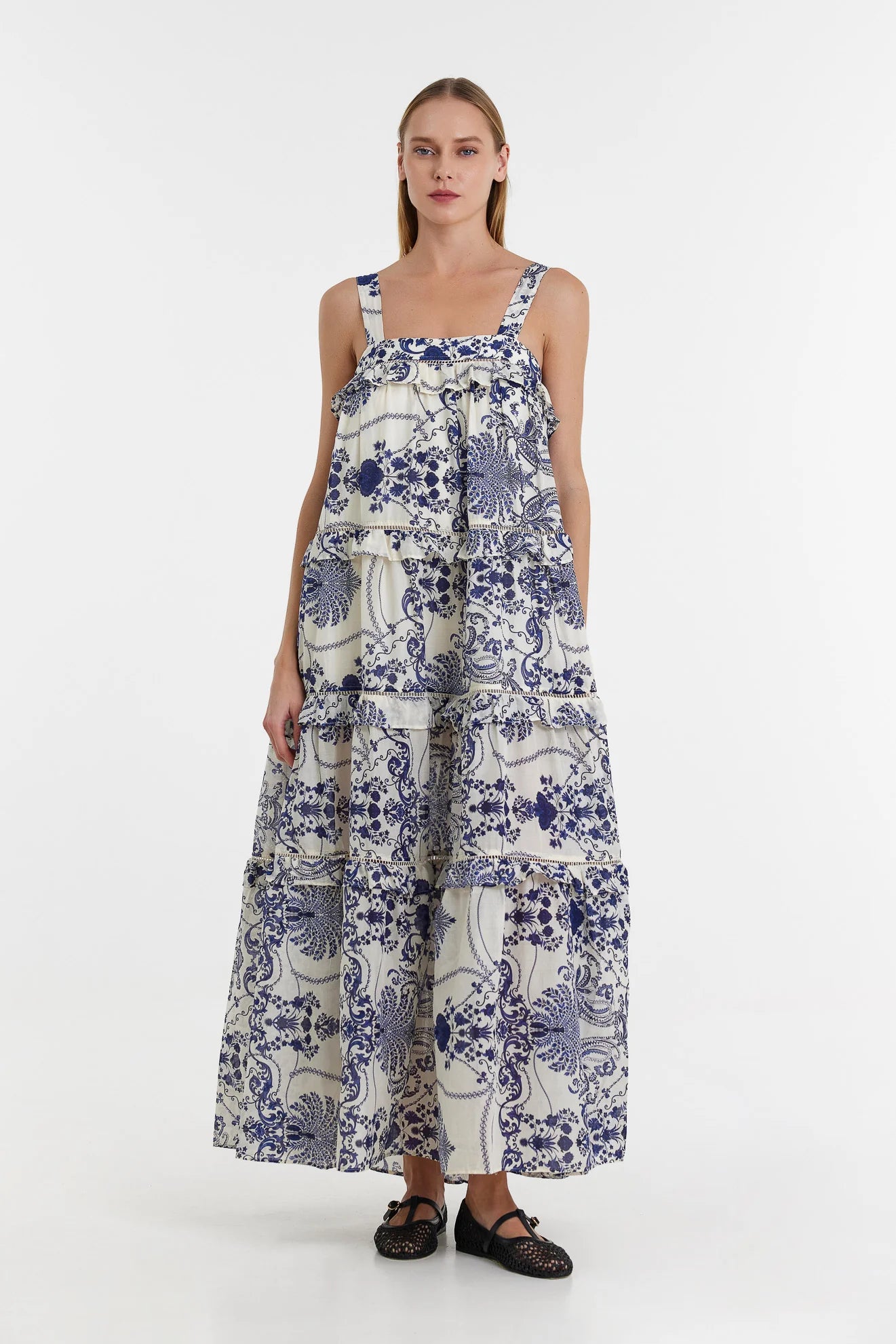 Long tiered maxi dress with ruffles in a navy and ecru willow inspired print