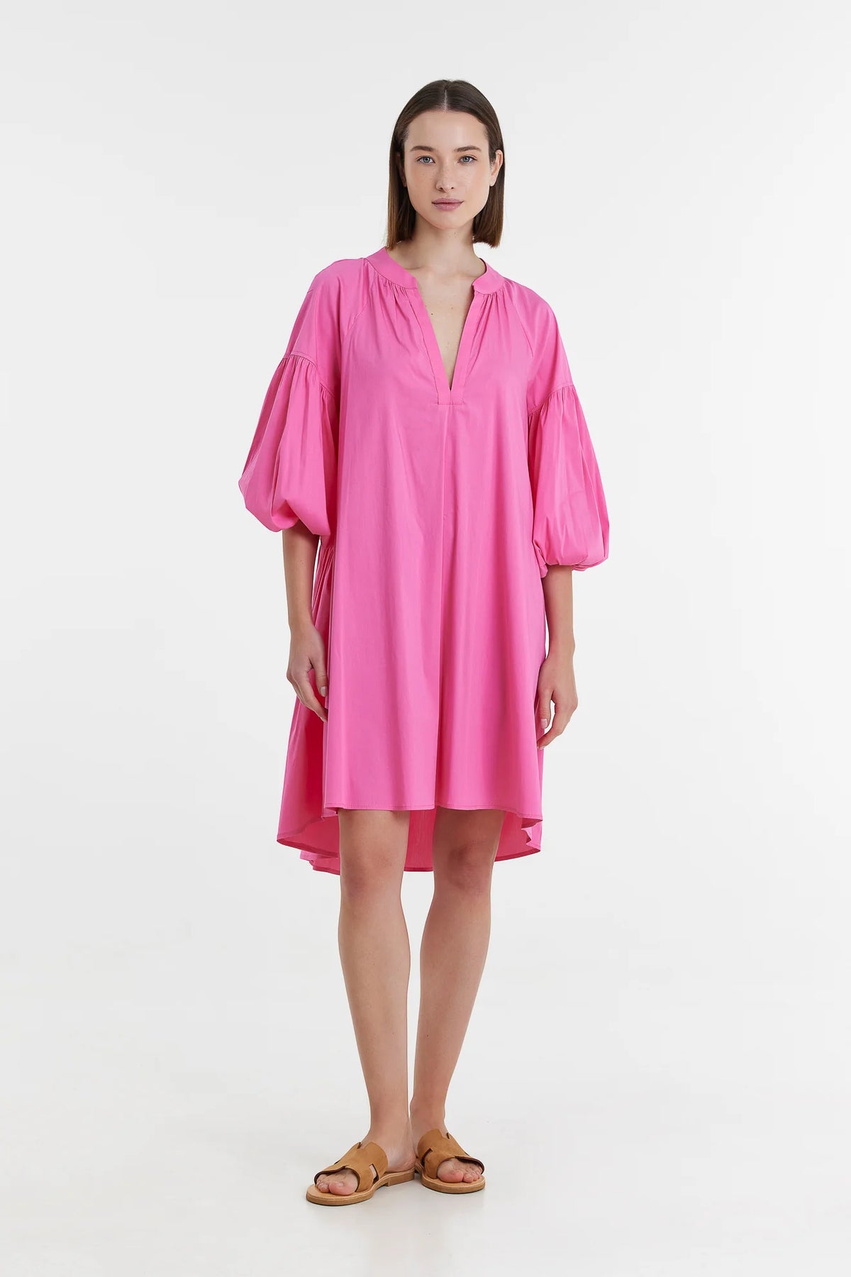 Pink long sleeve dress with notch neck and full sleeves with elasticated waist