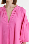Pink long sleeve dress with notch neck and full sleeves with elasticated waist