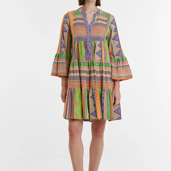 Biege notch neck beach dress with long fluted sleeves and tiered skirt with neon green orange and purple embroidery